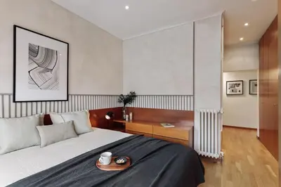 a bedroom with a bed with a tray on it at Sabate - 3 bedrooms and office in Sant Gervasi in Barcelona