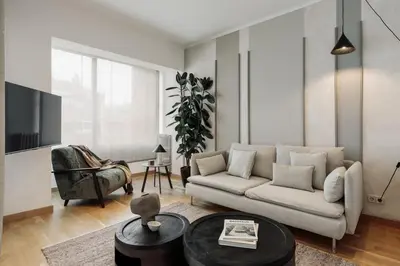a bedroom with a large bed and a window at Sabate - 3 bedrooms and office in Sant Gervasi in Barcelona
