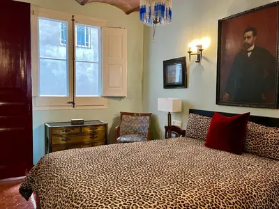 a bedroom with a bed and a large window at Fabulous Luxury in Best Location of City Centre in Barcelona