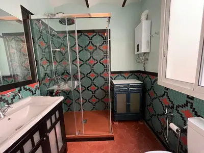 a bathroom with a shower and a sink at Fabulous Luxury in Best Location of City Centre in Barcelona