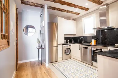 a kitchen with a washer and dryer at E2MAL1052 - Fantastic apartment next to Sagrada Fa in Barcelona