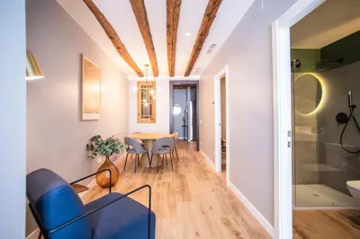 a dining room with a table and chairs at E2MAL1052 - Fantastic apartment next to Sagrada Fa in Barcelona