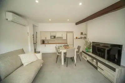 a living room with a couch and a table at Cal Rami in Castellbell i Vilar