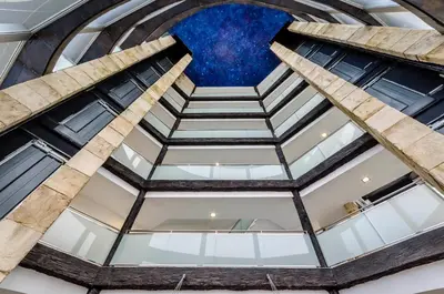 a view of the ceiling of a building at Exe Cunit Suites & Spa in Cunit