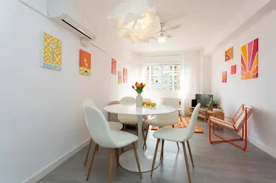 a dining room with a table and chairs at Key Barcelona Diagonal Mar in Barcelona