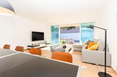 a bedroom with a bunk bed and a window at Villa Senita with Private Pool, close to Sitges in Olivella