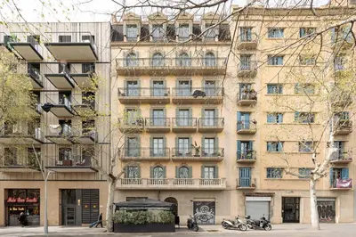 a large building with balconies on the side of it at Ola Living Viladomat in Barcelona