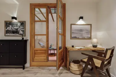 a dining room with a table and a brick wall at Komodo - 3 bedrooms and terrace in El Born in Barcelona