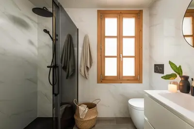 a bedroom with a desk and a bed and a window at Komodo - 3 bedrooms and terrace in El Born in Barcelona