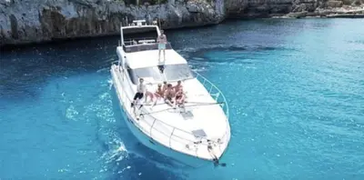 a group of people on a boat in the water at Waterfront Cozy two bedrooms in Barcelona