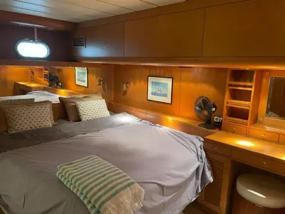 a large bed in the back of a boat at Waterfront Cozy two bedrooms in Barcelona