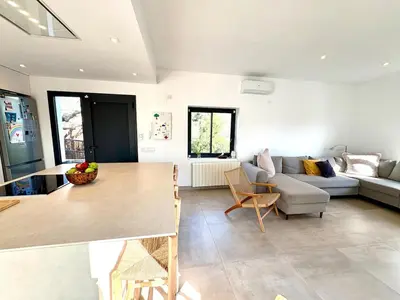 a living room with a couch and a table at Mi casa soñada in Sant Pere de Ribes