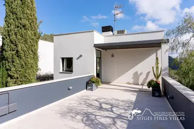 a white house with a driveway at Cool and Stylish Villa Avanti with Private Pool, Beautiful Views and Air Conditioniing in Olivella