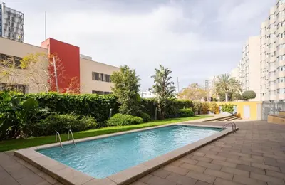 a swimming pool in the middle of a building at Av d'Eduard Maristany, 13 in Sant Adria de Besos