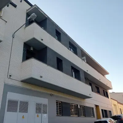 an apartment building with a balcony on the side of it at Apartamento Castellet1 in San Vicente de Castellet