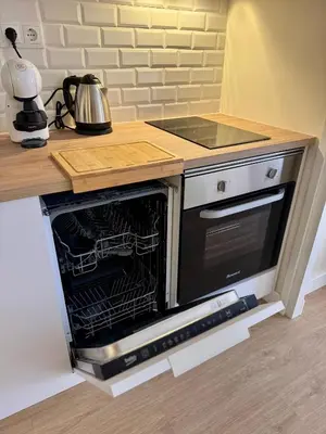 a microwave oven with its door open in a kitchen at Loft Premium en Barcelona in Barcelona