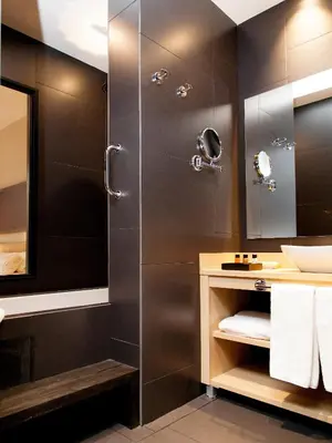 a bathroom with a shower and a sink at Hotel Àmbit Barcelona in Barcelona