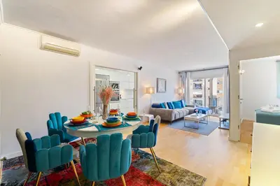 a living room with a table and chairs at Mediterranean Soul Experience in Montgat