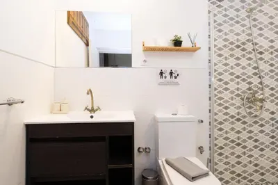 a bathroom with a sink and a shower at Estudios a 10' caminando de la playa y a 20' de Barcelona Centro in Sant Adria de Besos