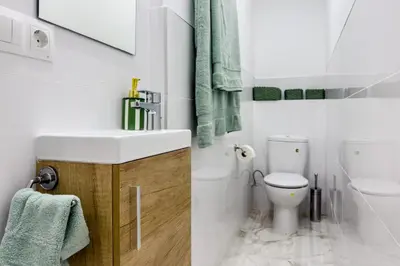 a bathroom with a sink and a toilet at Bonito Apartamento en Ronda Sant Pau in Barcelona
