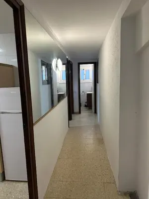 a hallway leading to a kitchen in a house at Vallromanes House of Peace and Rest in Vallromanas