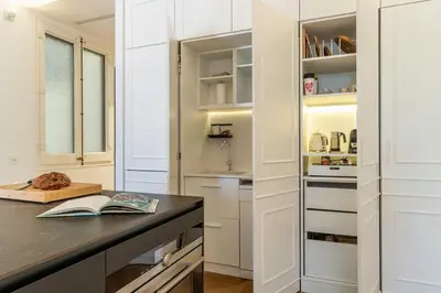 a room with a desk with a computer and a window at Canela Homes MIDTERM ELEGANCE in Barcelona