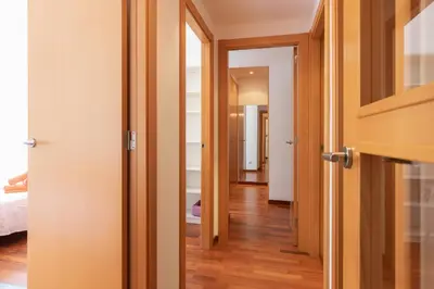 a hallway with a door open to a room at Lets Holidays Terrace Barcelona in Barcelona