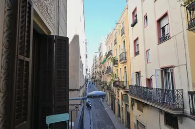 a view of an alley in a city with buildings at Homenfun Barcelona Avenida Diagonal in Barcelona