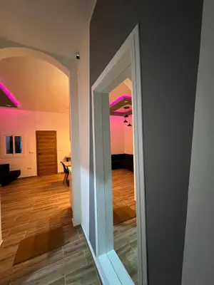 a hallway with an open door to a room at Modern apartment Barcelona in Badalona