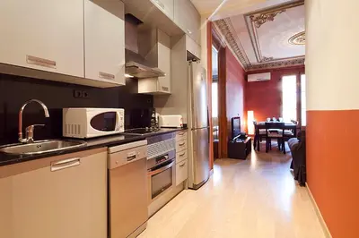 a kitchen with a sink and a microwave at Catalunya Executive 3 bedrooms, 3 bathrooms AC wifi in Barcelona