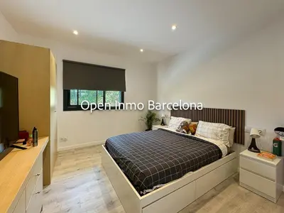 a bedroom with a bed in a room at Alquiler temporal en Canyelles - OI01937 in Canyelles