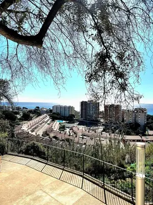 a view of a city with buildings in the background at Vistas al mar y garaje cerca de BCN in Sant Vicenç de Montalt