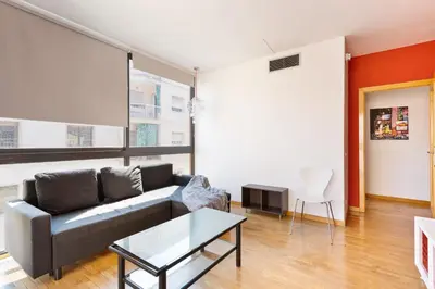 a living room with a couch and a table at Stay U-nique Apartments Bonsoms in Barcelona