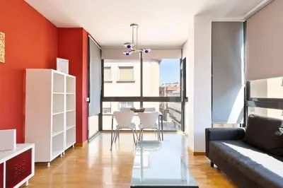 a living room with a couch and a table at Stay U-nique Apartments Bonsoms in Barcelona