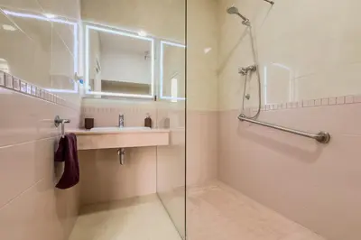 a bathroom with a sink and a shower at Habitación 1 NOU DE LA RAMBLA in Barcelona