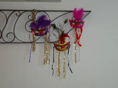 a metal rack with four decorations on a wall at Apartment Dolce Vita lovely in Sitges
