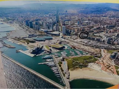 an aerial view of a city with a harbor at Luz y Mar II in Barcelona