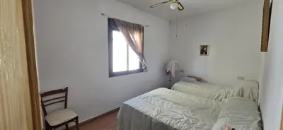 a bedroom with two beds and a window at Metrópolis in Barcelona