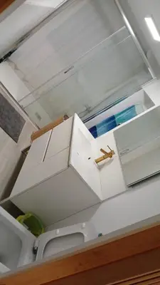 a white box sitting on top of a boat at Ink House in Barcelona