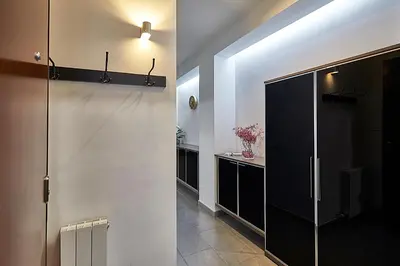 a bathroom with a glass door and a walk in shower at BBarcelona Brusi Flat in Barcelona