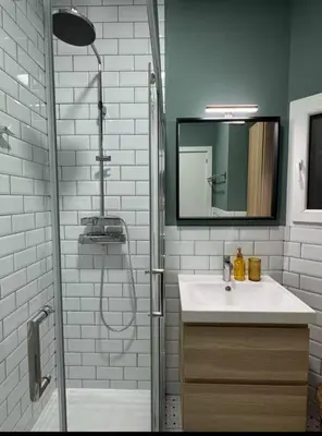 a bathroom with a shower and a sink and a mirror at studio Espania in Hospitalet de Llobregat