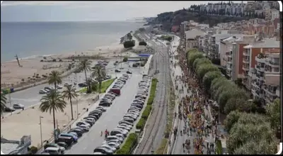 an aerial view of a beach with a crowd of people at Precioso y espacioso piso in Arenys de Mar