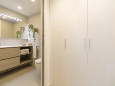 a bathroom with a toilet and a sink at Seafront Apartment in Calella with Beach Access in Calella