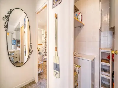 a bathroom with a mirror and a sink at Apartment in Calella near the Beach in Calella