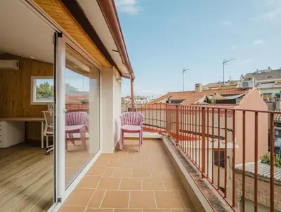 a white bathroom with a sink and a shower at Large townhouse in St Cugat in Sant Cugat del Vallès