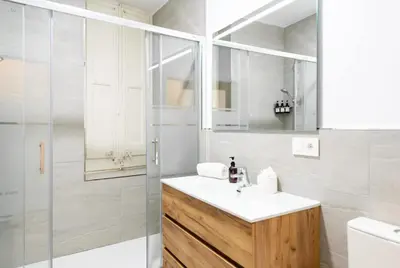 a bathroom with a sink and a shower at Unique 16th-Century Masia, Pool & Private Events in Barcelona