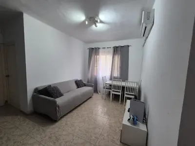 a living room with a couch and a table at Marry home in Barcelona