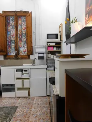 a kitchen with a sink and a counter top at A pasos de la playa en Barcelona! in Barcelona