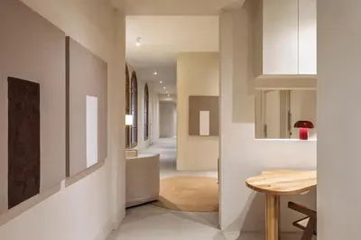 a hallway of a home with a table and a dining room at The Boulevard by Aspasios in Barcelona