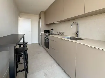 a kitchen with a sink and a counter top at Stay U-nique Apartments at Albigesos in Barcelona